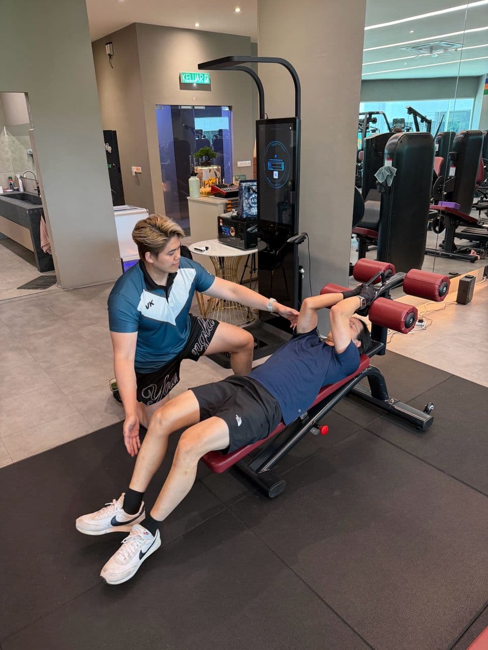 Viking Fitness coach guiding a client through a session